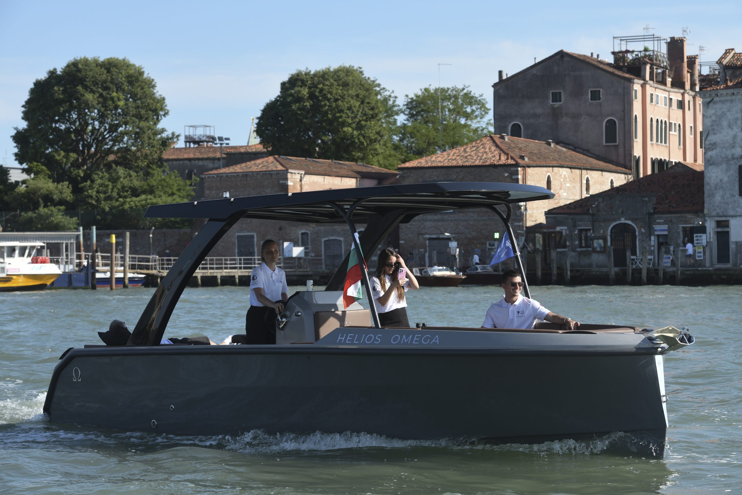 Side view of the Helios Omega 7.2 sailing through Venice