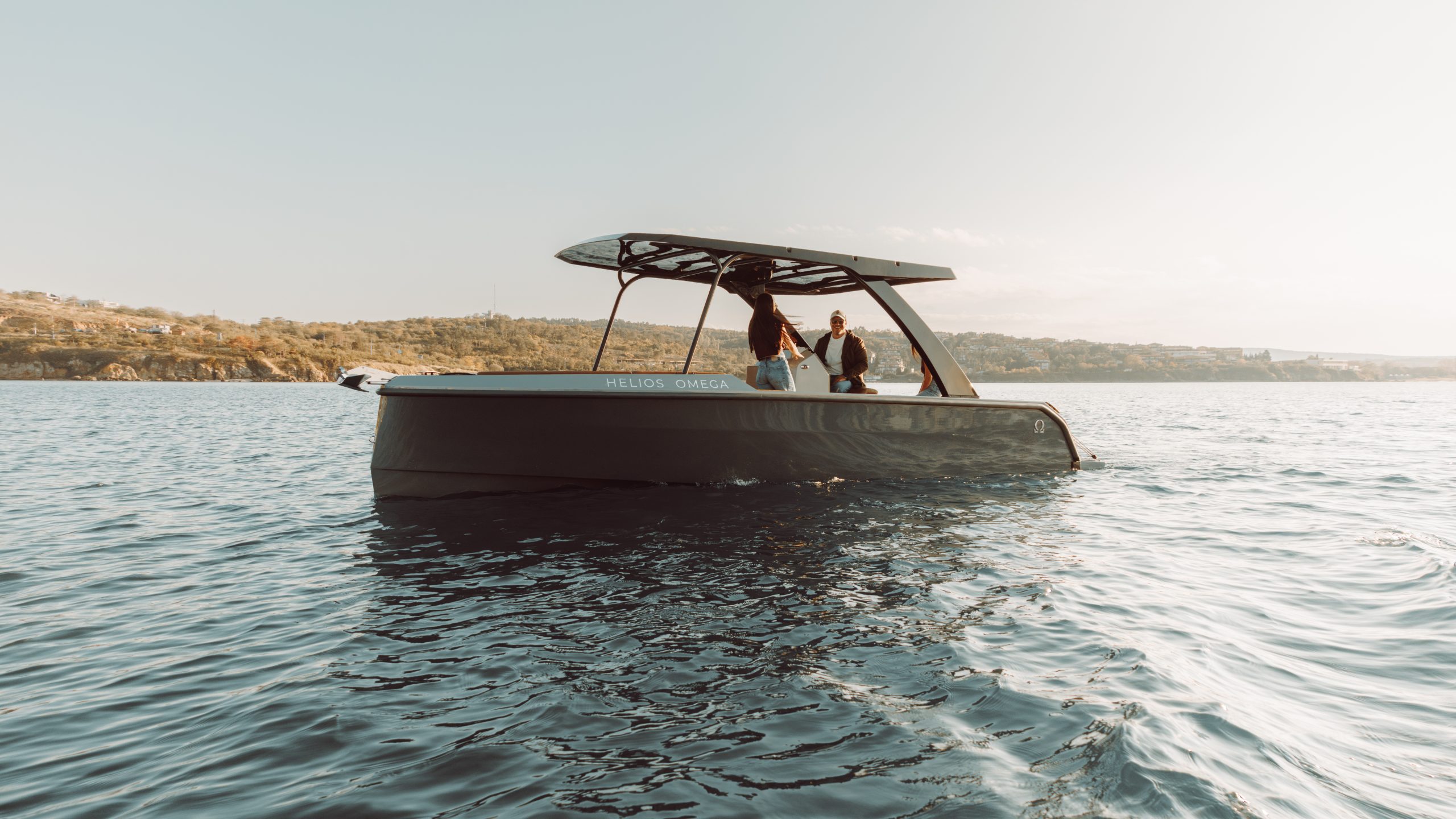 Helios Omega 7.2 electric day cruiser sailing on open water
